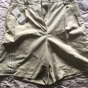 Pleated “golf shorts”